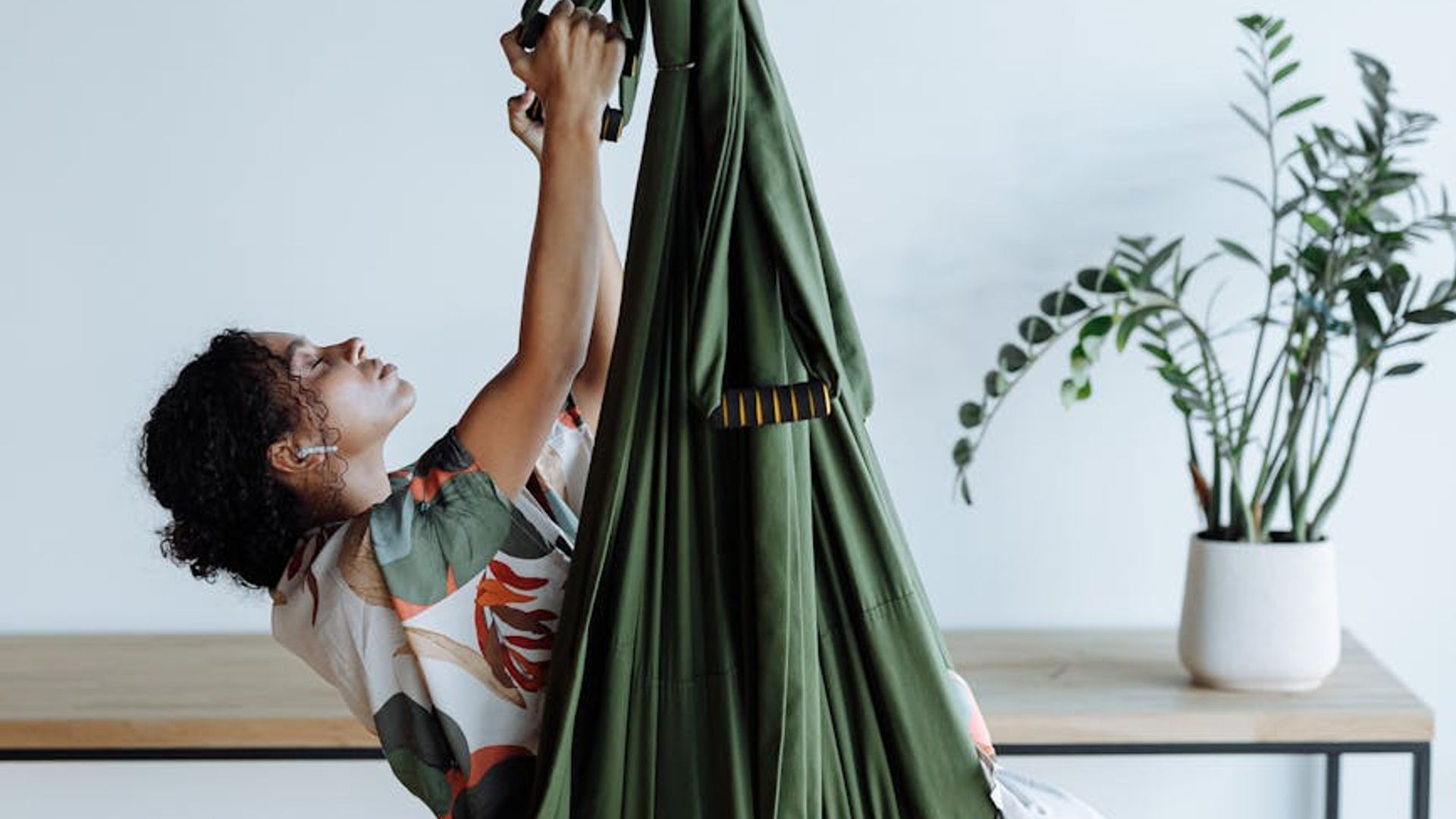Serene empty yoga studio with soft ambient light.